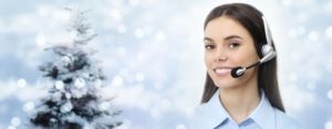 smiling woman help desk during the holiday season 