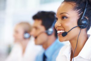 Call center representatives at a help desk using VOIP 