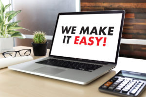 WE MAKE IT EASY! on laptop screen, Managed Service Provider (MSP) concept 