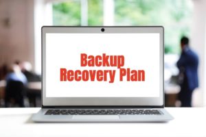 Backup Recovery Plan on a laptop screen in office 