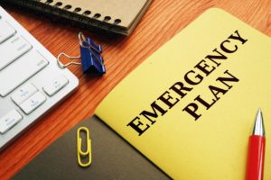 A folder containing emergency/disaster recovery plans 