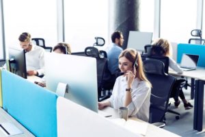 Team of diverse employees working for a call center company. 